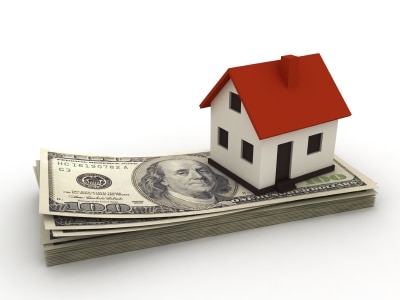 Home on Stack of Bills For Real Estate - David Mize