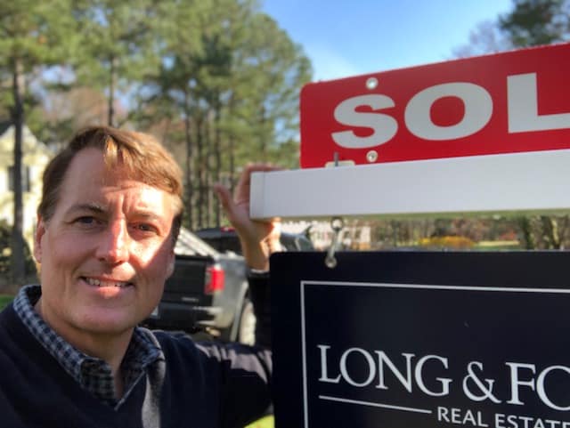 David Mize with Sold Sign